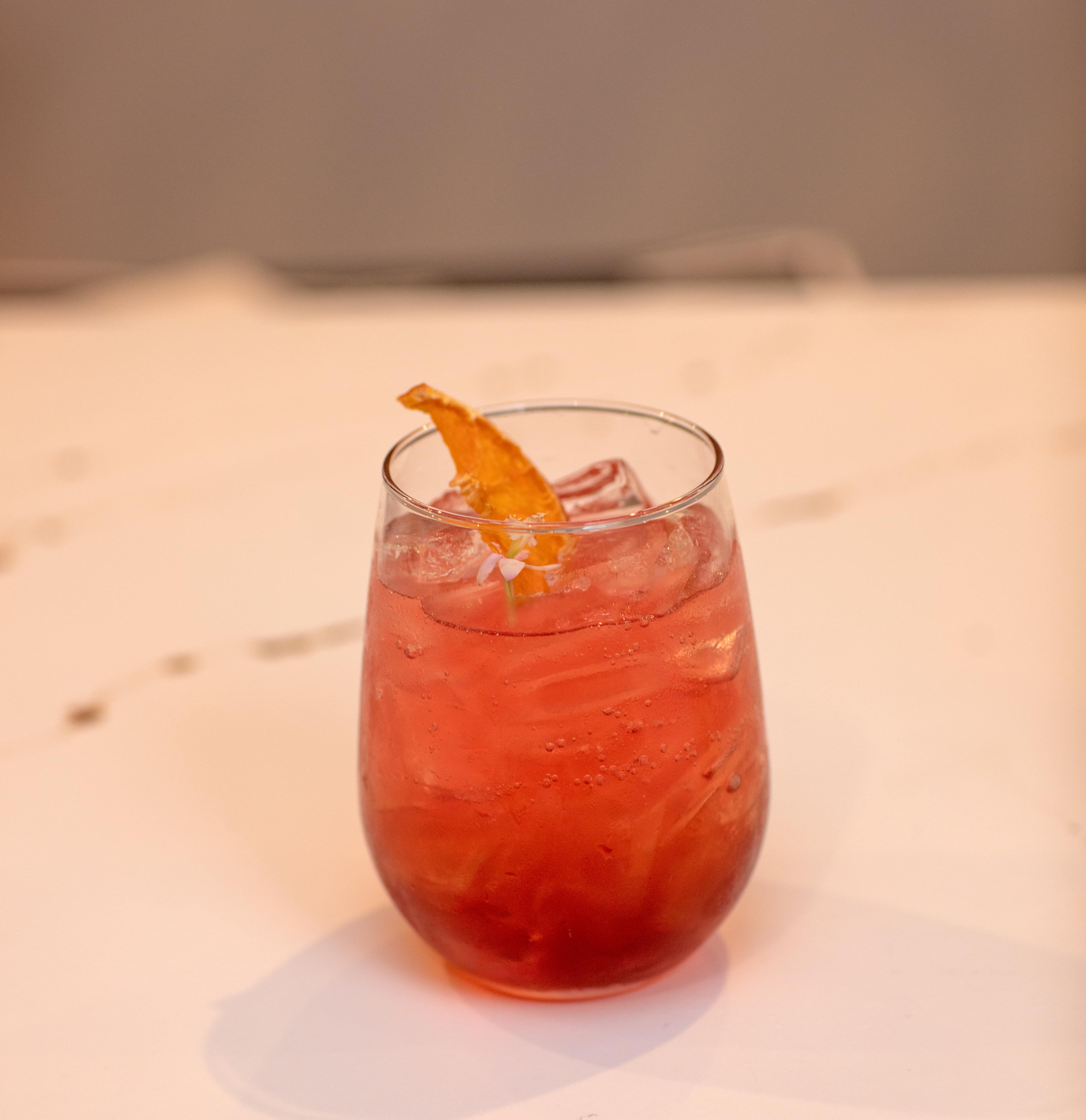 Spritz with a charred orange peel