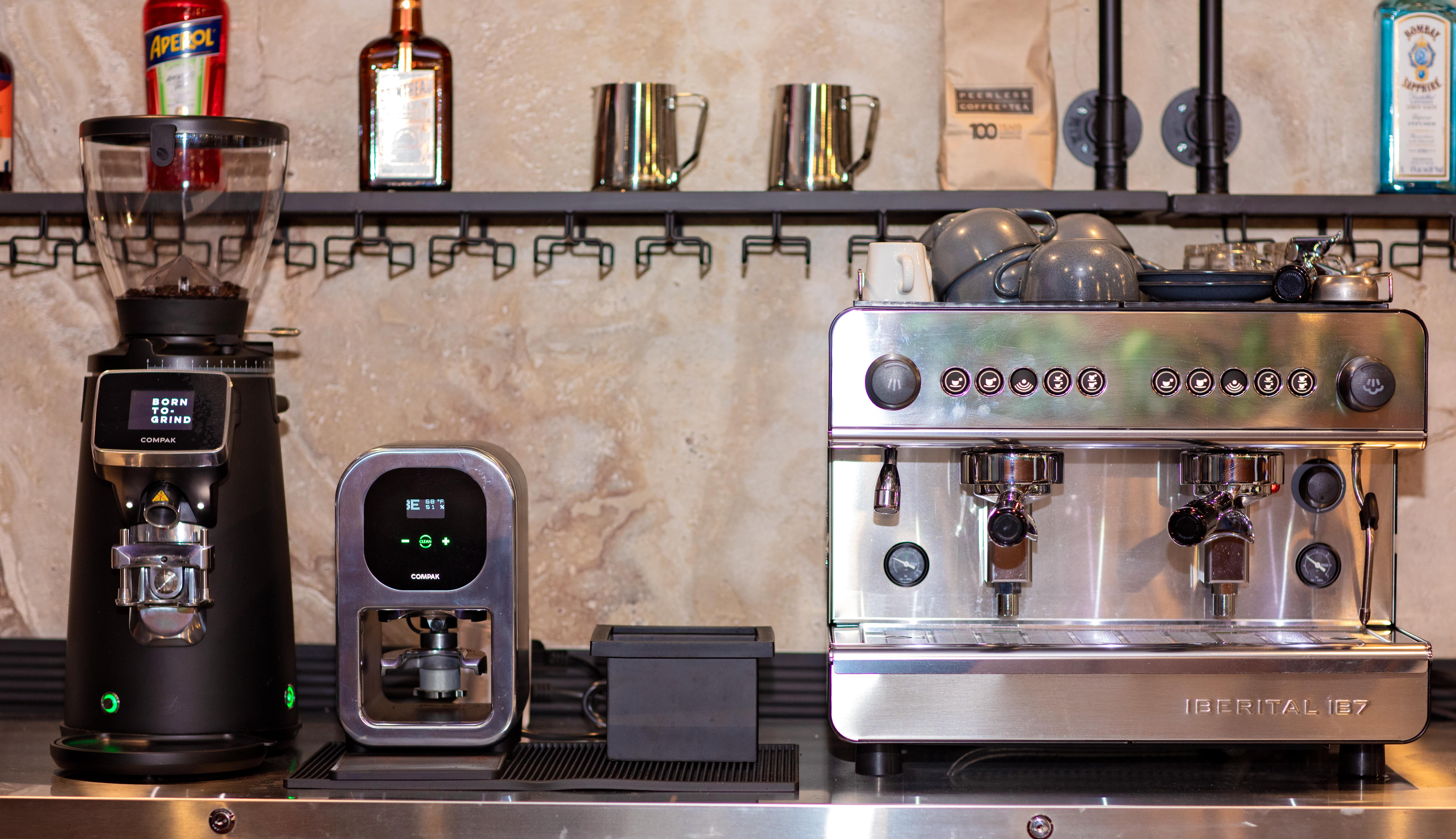 Espresso machines and grinders on the coffee station